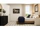 Well-lit bedroom showcasing a cozy bed, tasteful decor, and ample natural light at 120 Sunny Side Way, Acworth, GA 30102