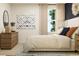 Cozy bedroom with neutral tones, a stylish dresser, and a comfortable queen bed at 120 Sunny Side Way, Acworth, GA 30102