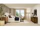 Serene bedroom featuring a plush bed, ample natural light, and tasteful decor at 120 Sunny Side Way, Acworth, GA 30102