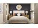 Well-lit bedroom featuring a queen size bed and stylish decorative pillows at 120 Sunny Side Way, Acworth, GA 30102