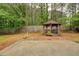 Serene backyard featuring a charming gazebo, perfect for outdoor relaxation and entertaining at 1917 Kevin Dr, Conyers, GA 30013