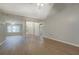 Open-concept living room with lots of natural light, high ceilings, and beautiful floors at 1917 Kevin Dr, Conyers, GA 30013