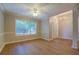 Bright and open living room with fresh paint, featuring hardwood floors at 1917 Kevin Dr, Conyers, GA 30013