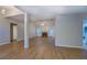 Large open living space with hardwood floors, a fireplace, and plenty of natural light at 1917 Kevin Dr, Conyers, GA 30013
