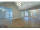 Spacious living room with beautiful floors, high ceilings, and a view into the kitchen at 1917 Kevin Dr, Conyers, GA 30013