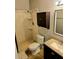 Bathroom featuring a tiled shower, vanity, and neutral decor elements at 204 Millpond Pkwy, Villa Rica, GA 30180