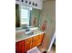 Bathroom featuring vanity with wood cabinets and generous counter space at 204 Millpond Pkwy, Villa Rica, GA 30180