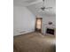 Comfortable living room featuring neutral carpet, a fireplace, and a modern ceiling fan at 204 Millpond Pkwy, Villa Rica, GA 30180