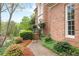 Lovely landscaped walkway and garden leading to the front entry of this well maintained home at 205 Wellesley Ct, Woodstock, GA 30189