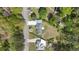 Aerial view of the house and the surrounding properties showing the layout of the neighborhood at 2125 Perkerson Mill Rd, Austell, GA 30106