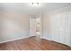 Simple bedroom with hardwood floors and a closet at 2125 Perkerson Mill Rd, Austell, GA 30106