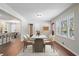 Formal dining room with stylish decor, hardwood floors, and sun-filled windows at 2125 Perkerson Mill Rd, Austell, GA 30106