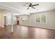 Open living room with hardwood floors, large windows that fill the space with natural light at 2125 Perkerson Mill Rd, Austell, GA 30106