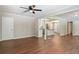 Spacious living room with hardwood floors and view of the kitchen at 2125 Perkerson Mill Rd, Austell, GA 30106