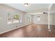 Spacious living room featuring hardwood floors, recessed lighting, and multiple windows at 2125 Perkerson Mill Rd, Austell, GA 30106