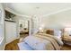 Charming bedroom with built-in shelving and a decorative chandelier at 2488 Glendale Se Cir, Smyrna, GA 30080