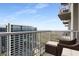 Enjoy city views from this comfortable balcony seating area at 855 Peachtree Ne St # 2706, Atlanta, GA 30308