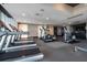 Bright, well-equipped gym featuring treadmills, ellipticals, and modern fitness equipment at 855 Peachtree Ne St # 2706, Atlanta, GA 30308