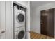 Efficient laundry closet with stacked washer and dryer, optimizing space in a modern design at 855 Peachtree Ne St # 2706, Atlanta, GA 30308