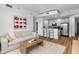 Spacious living area with a modern kitchen, comfortable seating, and stylish decor, creating an inviting atmosphere at 855 Peachtree Ne St # 2706, Atlanta, GA 30308