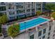 Rooftop pool with lounge chairs and landscaped areas offering relaxation and stunning views at 855 Peachtree Ne St # 2706, Atlanta, GA 30308