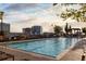 Relaxing rooftop pool area with city views, perfect for leisure and recreation at 855 Peachtree Ne St # 2706, Atlanta, GA 30308