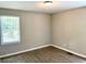 Bright bedroom featuring updated floors and plenty of natural light at 955 Margaret Nw Pl, Atlanta, GA 30318