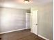 Bedroom with new flooring, neutral walls, and white doors at 955 Margaret Nw Pl, Atlanta, GA 30318