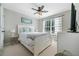 Bright bedroom with a ceiling fan, neutral tones, a double bed, and ample natural light at 155 Glenside Ln, Duluth, GA 30097