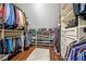 Walk-in closet with custom shelving and storage solutions for clothing, shoes, and accessories at 155 Glenside Ln, Duluth, GA 30097