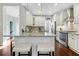 Updated kitchen featuring granite countertops, stainless steel appliances, and a breakfast bar with seating at 155 Glenside Ln, Duluth, GA 30097