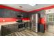 Bright kitchen featuring stainless steel appliances, modern wood grain flooring, and recessed lighting at 173 Michael Ln, Mcdonough, GA 30252