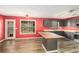 Spacious kitchen with stainless steel appliances, an island, hardwood floors, and an adjacent dining area at 173 Michael Ln, Mcdonough, GA 30252