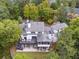 Back of house from aerial perspective featuring outdoor living spaces and lush greenery at 21 Edgewater Se Dr, Cartersville, GA 30121