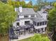 Aerial view of the back of the home, showing deck, covered patio, and screened porch at 21 Edgewater Se Dr, Cartersville, GA 30121