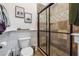 Bright bathroom featuring a glass enclosed shower, neutral color palette and decor at 21 Edgewater Se Dr, Cartersville, GA 30121