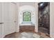 Bathroom featuring a soaking tub, walk-in shower, and stylish finishes at 21 Edgewater Se Dr, Cartersville, GA 30121