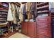 An organized walk-in closet with custom built-ins, drawers, and shelves for maximum storage at 21 Edgewater Se Dr, Cartersville, GA 30121