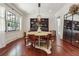 Bright dining room featuring hardwood floors, zebra rug and stylish accents at 21 Edgewater Se Dr, Cartersville, GA 30121