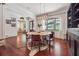Bright dining room features wood floors, stylish light fixture, and decorative animal print rug at 21 Edgewater Se Dr, Cartersville, GA 30121