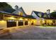Beautiful exterior of this spacious home with a three car garage and inviting front porch at dusk at 21 Edgewater Se Dr, Cartersville, GA 30121