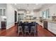Spacious kitchen with stainless steel appliances, ample countertop space and an island with bar stools at 21 Edgewater Se Dr, Cartersville, GA 30121