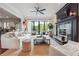Spacious living room with fireplace and access to a patio with beautiful views at 21 Edgewater Se Dr, Cartersville, GA 30121