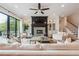 Bright, open living room with fireplace, access to patio, and comfortable seating at 21 Edgewater Se Dr, Cartersville, GA 30121
