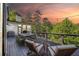 Cozy outdoor patio with dining and relaxing seating. String lights provide a warm ambiance at 21 Edgewater Se Dr, Cartersville, GA 30121