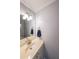 Well-lit bathroom with vanity, mirror, and neutral color scheme at 6221 Woodlore Nw Dr, Acworth, GA 30101