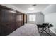 Spacious bedroom with a large closet, a piano, and a comfortable atmosphere at 6221 Woodlore Nw Dr, Acworth, GA 30101