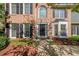 Close-up of the brick home's front entry, showcasing the door and surrounding details at 6221 Woodlore Nw Dr, Acworth, GA 30101