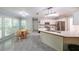 Spacious kitchen with white cabinetry, stainless steel appliances, and ample counter space at 6221 Woodlore Nw Dr, Acworth, GA 30101