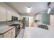 Spacious kitchen features stainless steel appliances and ample countertop space at 6221 Woodlore Nw Dr, Acworth, GA 30101